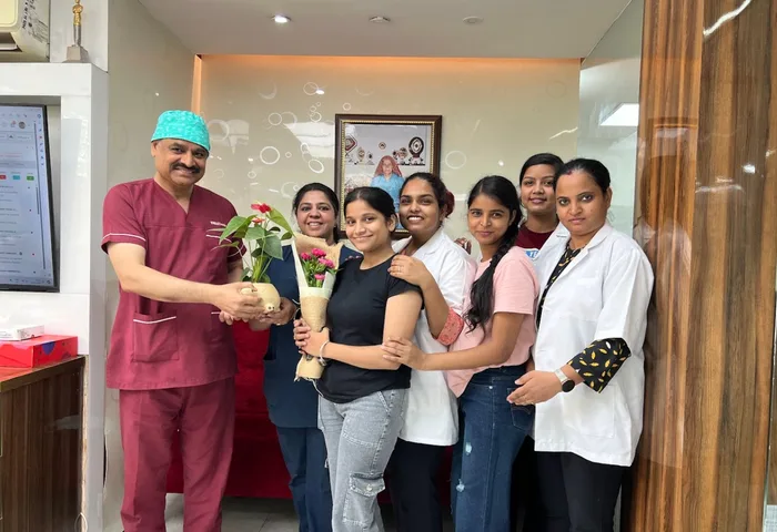 Muskaan Dentals team Gurgaon — Dr Suresh Ahlawat with staff